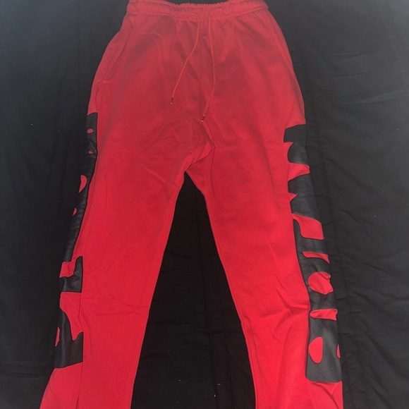 Sp5der Other - Bright Red Sweatpants with Elastic Waistband and Relaxed Fit